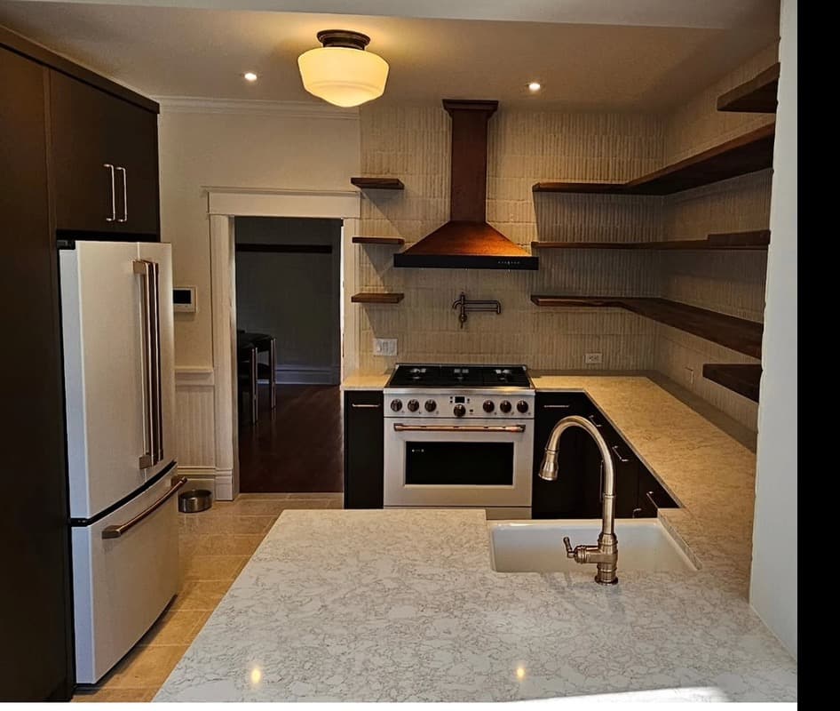 Finished kitchen remodel with under-cabinet and recessed lighting